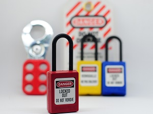 Lockout locks, a lockout hasp, and a tagout device.