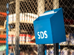 Safety Data Sheet box in a warehouse.