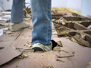 Person Stepping into Construction Floor Hole