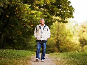 Older Gentleman Taking a Walk in the Park