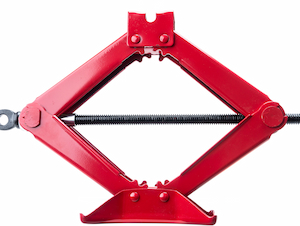 A red scissor jack extended on a white background, showing its screw mechanism and lifting arms.