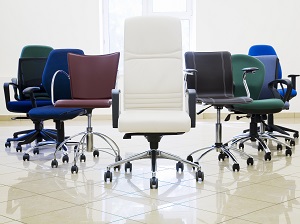 Several different office chairs in different colors.
