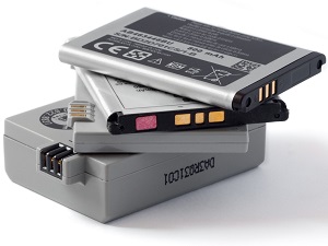 A stack of four lithium batteries.