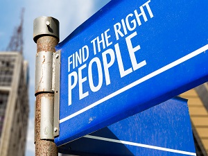 A blue sign that says Find the Right People.