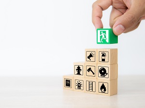 Building blocks with images of fire prevention icons.