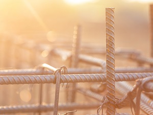 Close-up image of tied rebar on a construction site.