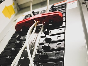 A breaker panel that has been locked so no one can accidentally turn it on.