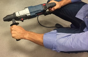 Man holding an electrical tool.