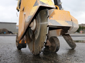 Close-up view of a walk-behind saw not in operation.