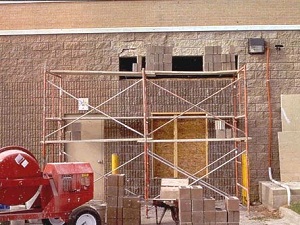 Supported scaffolds on a construction site.