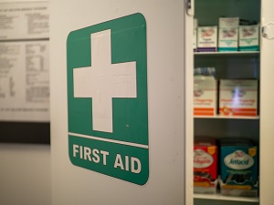 First Aid Kit on the Wall in a Workplace