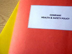 Folders that say Company Health and Safety Policy