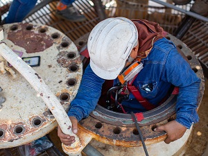 Worker Entering a Confined Space