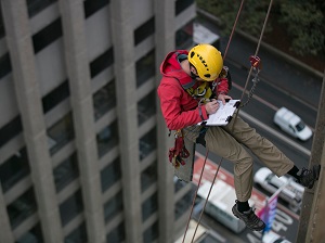 Worker Suspended in PFAS, Working at Extreme Heights Near Building