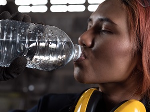 Worker Drinking Bottled Water