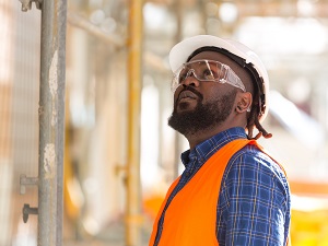 Worker Wearing PPE Including Safety Glasses