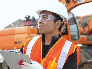 Construction Inspector Wearing Safety Glasses on Jobsite