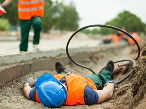 Worker Rushing to Help Another Worker Who is Injured