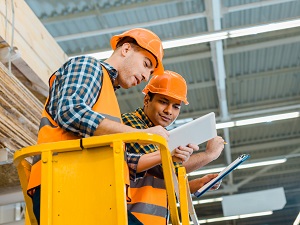 Two Workers Conducting Scissor Lift Inspection
