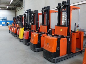 Forklifts, Parked in Large Warehouse