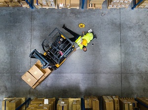 Warehouse Forklift Incident, Man is Injured, Co-Worker is Helping