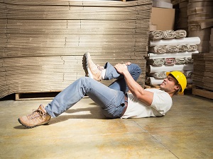 Warehouse Worker Hurt Leg, Laying on Ground