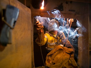 Worker Welding Inside Confined Space