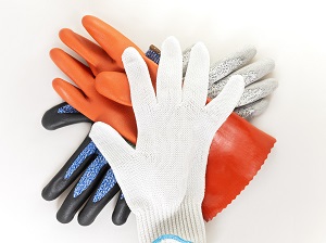 Assortment of different kinds of work gloves.