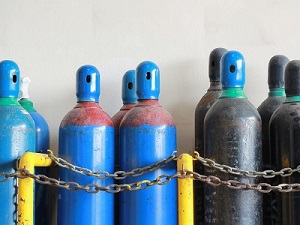 Compressed gas containers in storage.