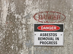 Danger sign that says Asbestos Removal in Progress