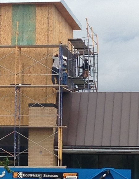 Construction Workers on Scaffolding with Inadequate Fall Protection