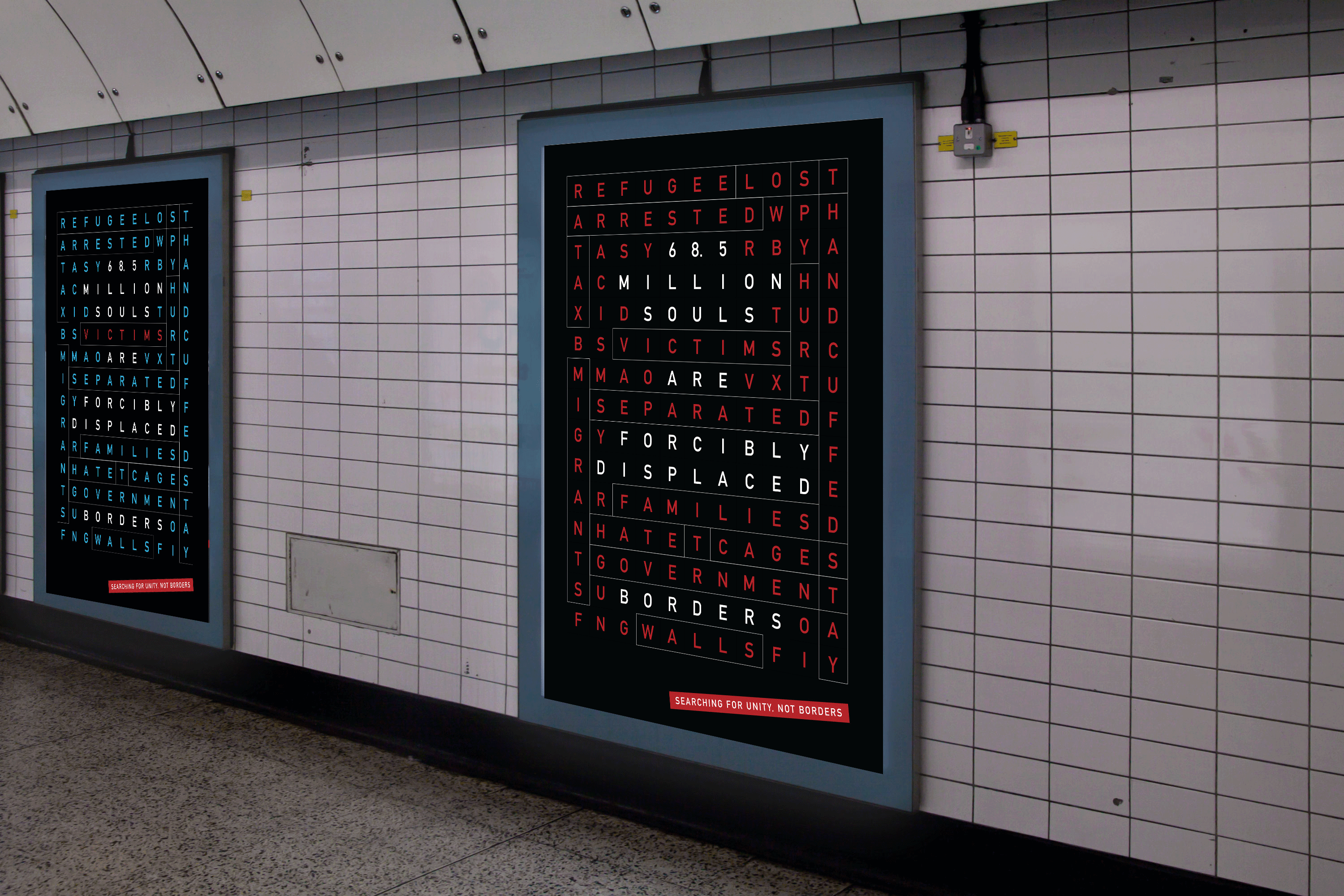two posters in a subway tunnel