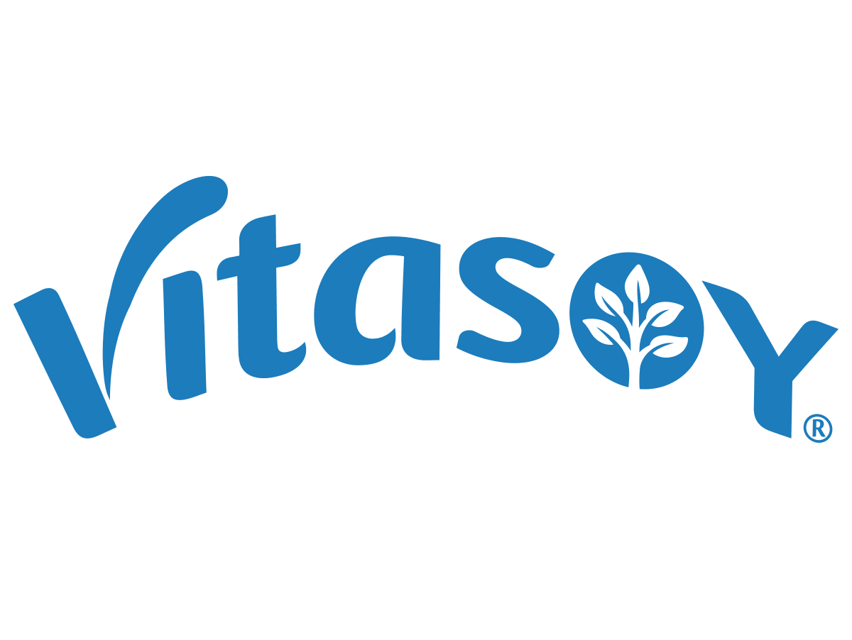 Animated Vitasoy brand sequence featuring the Vitasoy wordmark, a cheerful illustrated coffee cup character, the ‘IT’S PLANET MILK’ campaign slogan in bold blue typography, and the round plant-based symbol. The animation showcases key visual elements from Vitasoy’s Barista Edition packaging and campaign.