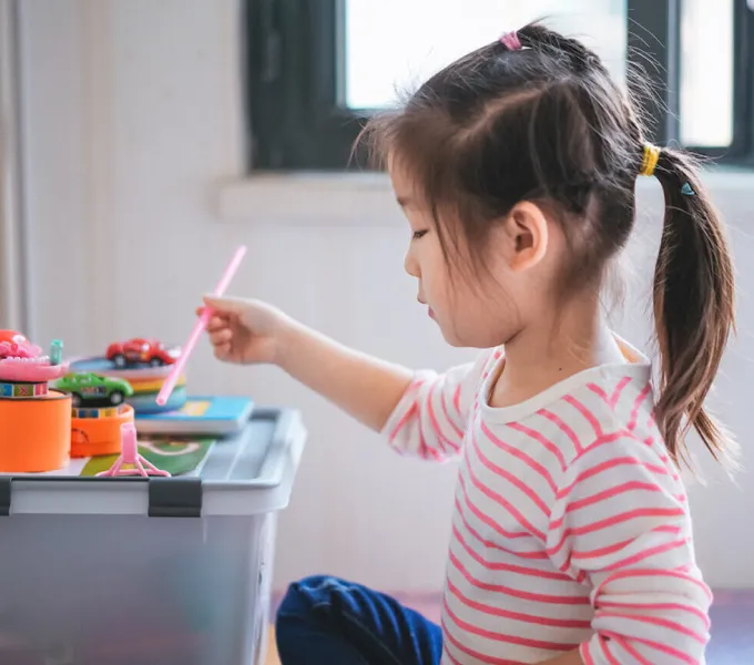 Little Girl Playing.