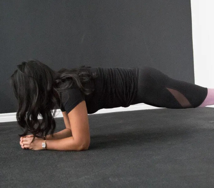 Woman planking.