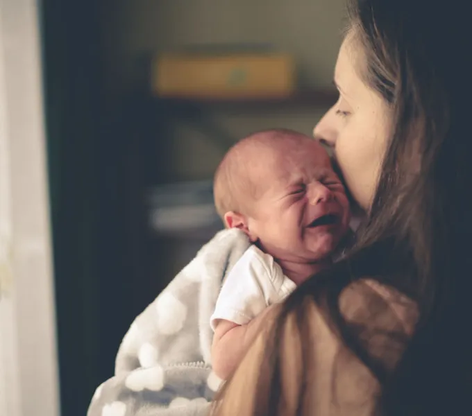 A mom and newborn baby after a c-section delivery.