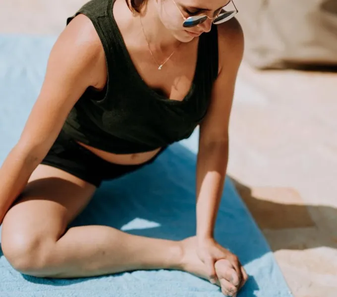 A woman doing pelvic floor exercises postpartum.