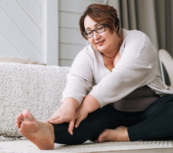 Mature woman doing exercises for her pelvic floor physical therapy appointment