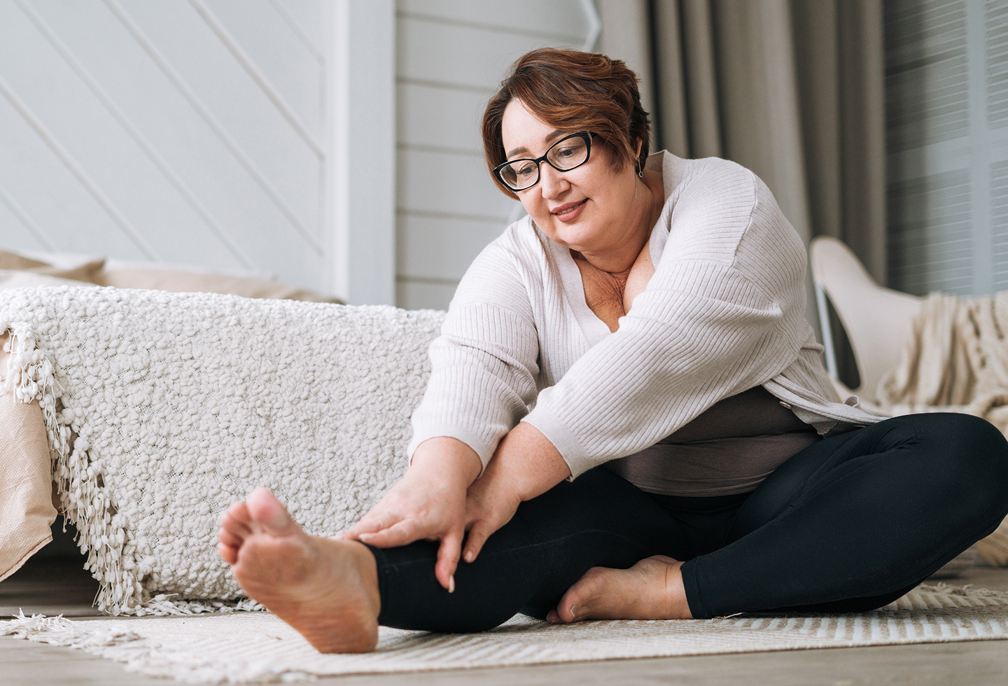 Mature woman doing exercises for her pelvic floor physical therapy appointment