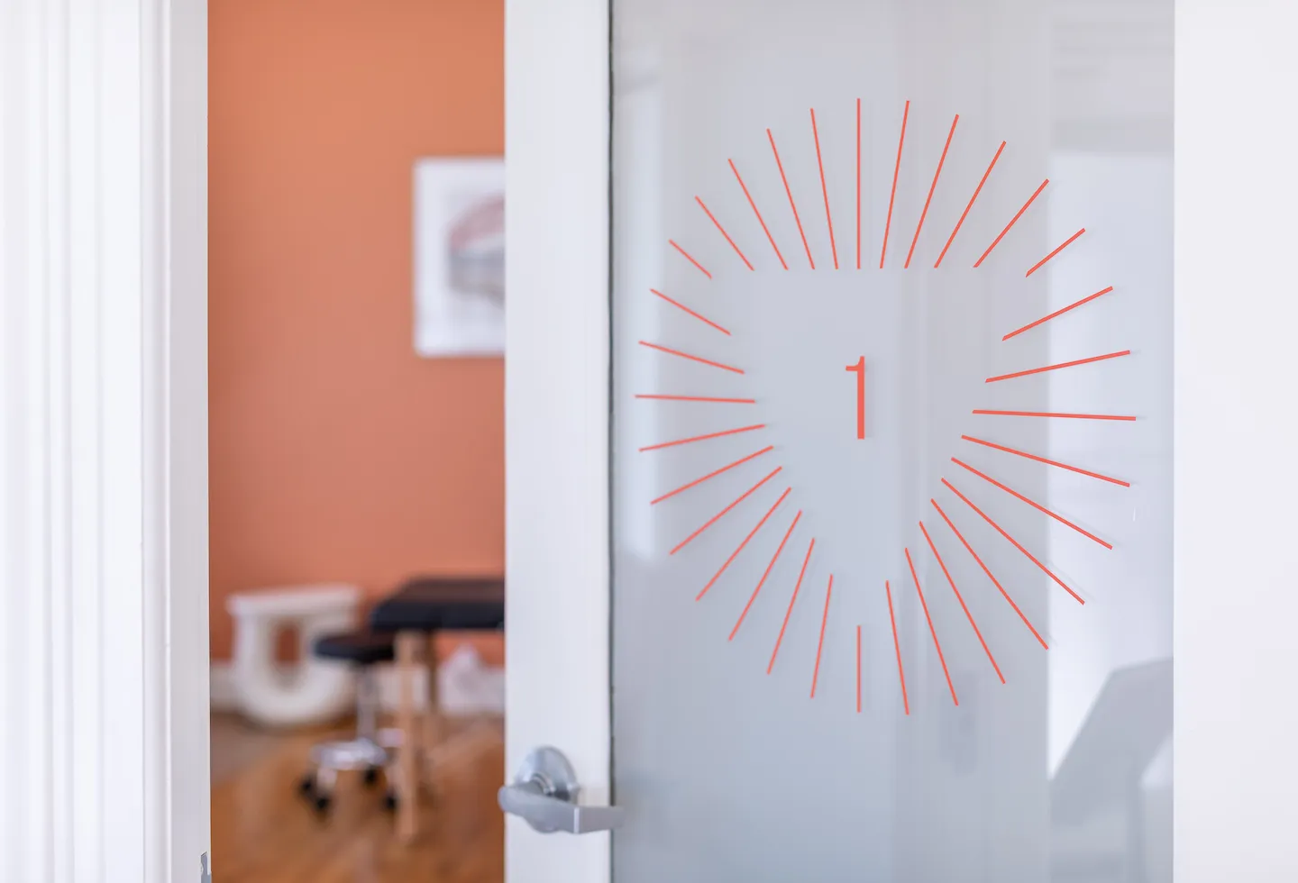 A door leading into a spa-like treatment room at Origin Physical Therapy in Glendale, Los Angeles, CA.