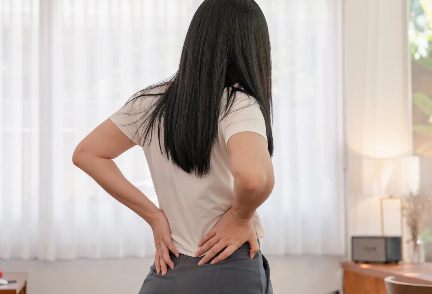 Woman with tailbone pain getting pelvic floor therapy.