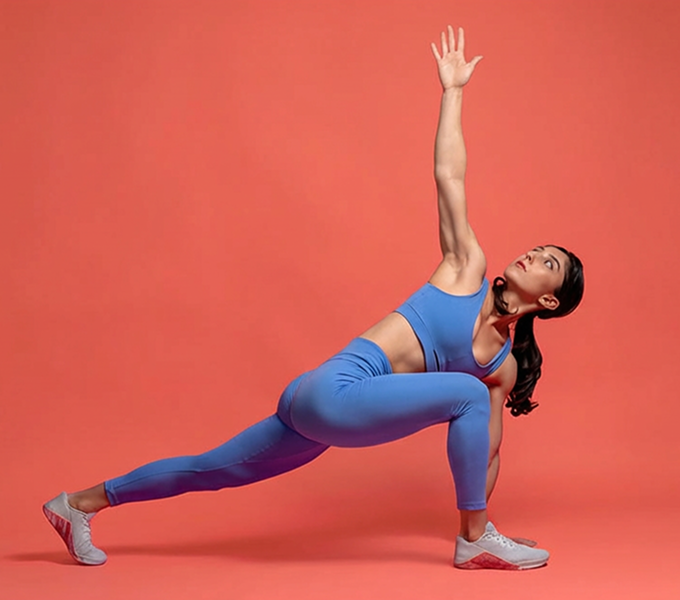 Woman doing world's greatest stretch to help her pelvic floor