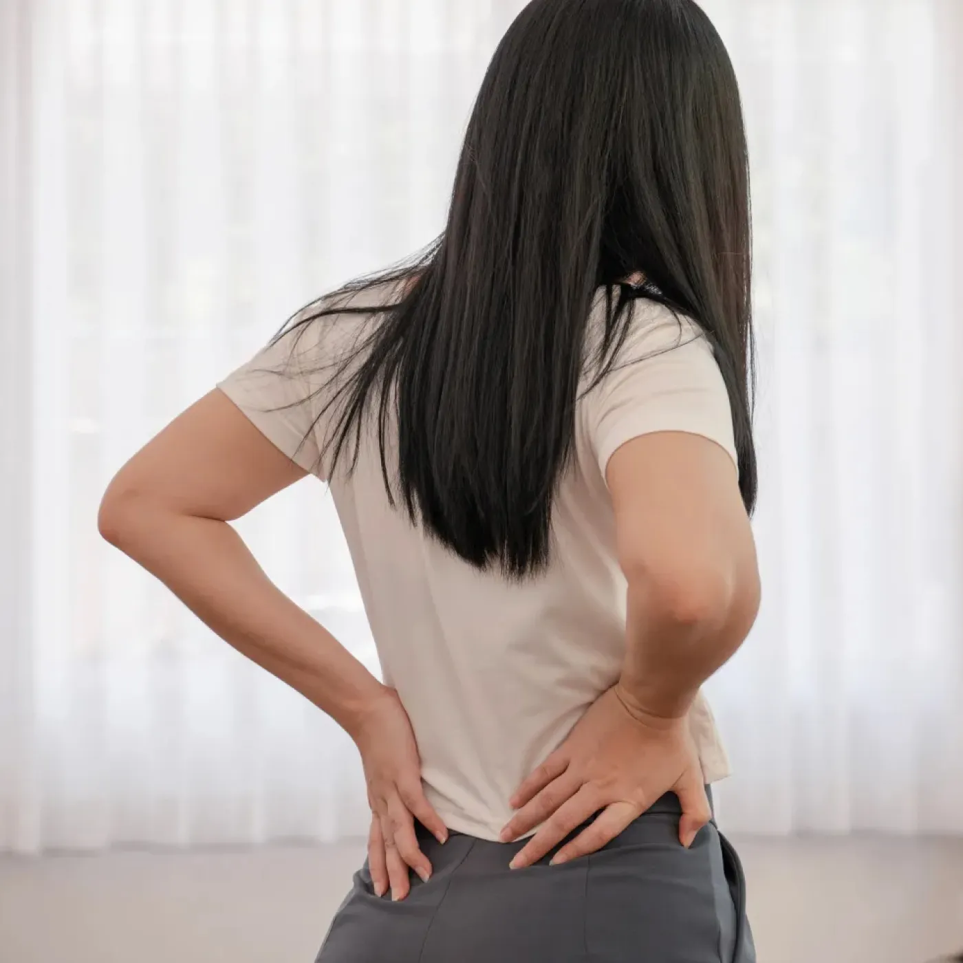 Woman with tailbone pain getting pelvic floor therapy.