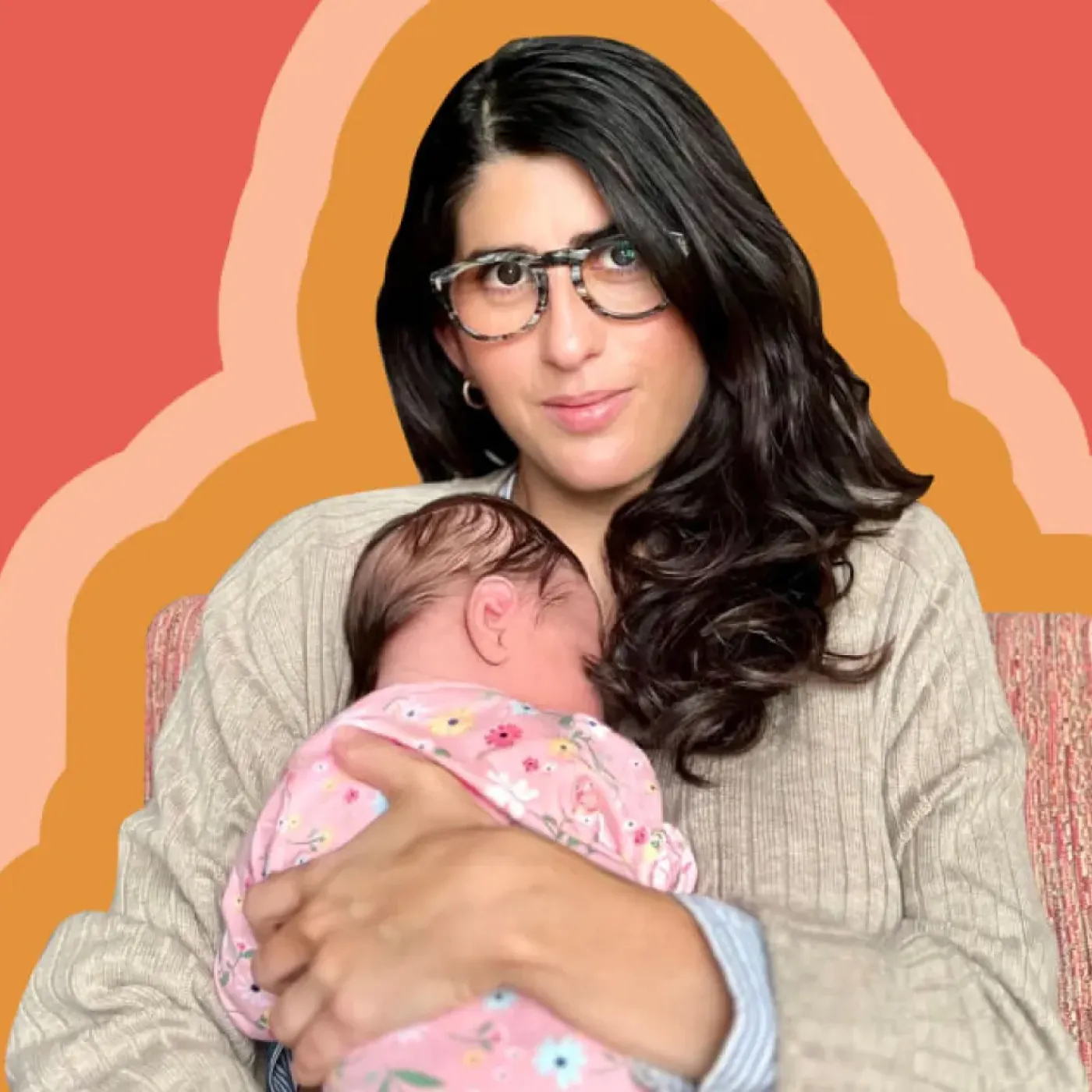 Origin CEO, Co-founder, and writer Carine Carmy confidently holds her newborn baby to her chest.