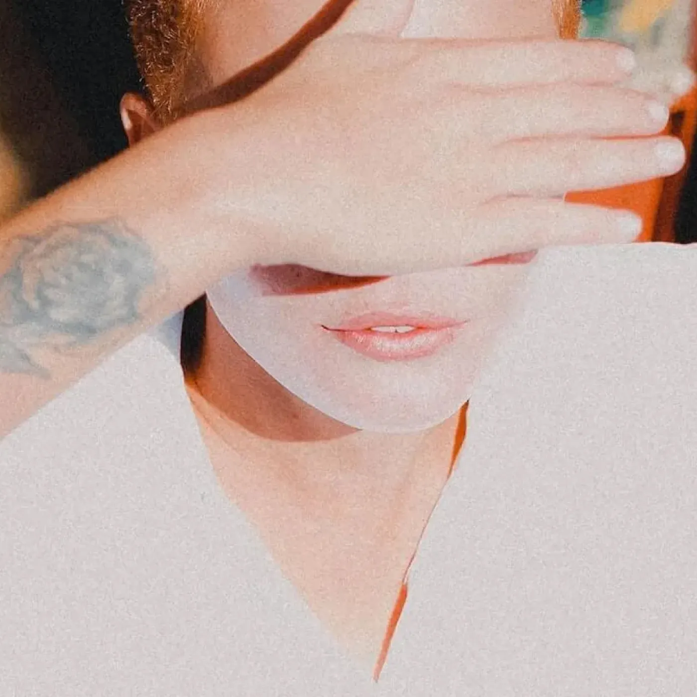 An image of a woman covering her eyes for an Informative Story On HPV And Cervical Cancer.