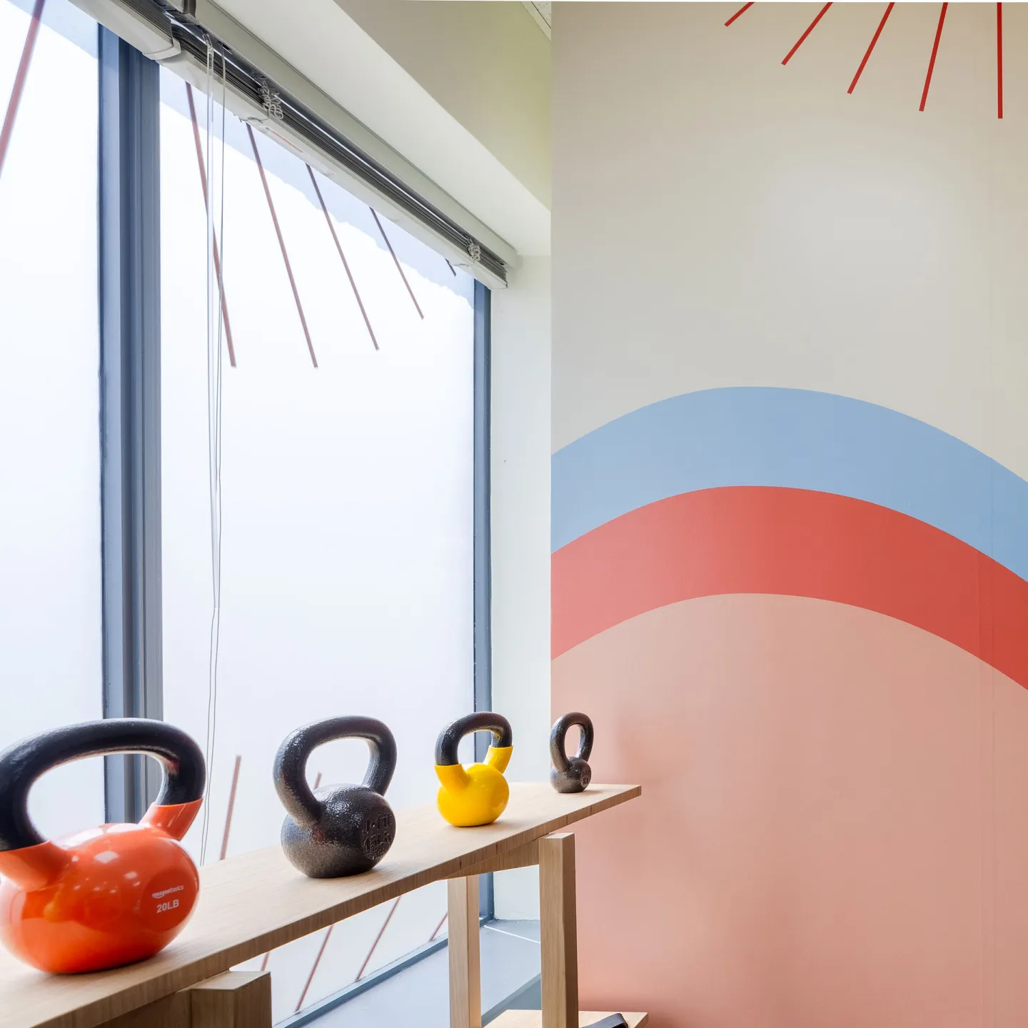 The brightly lit, cheerful clinic room at Origin.