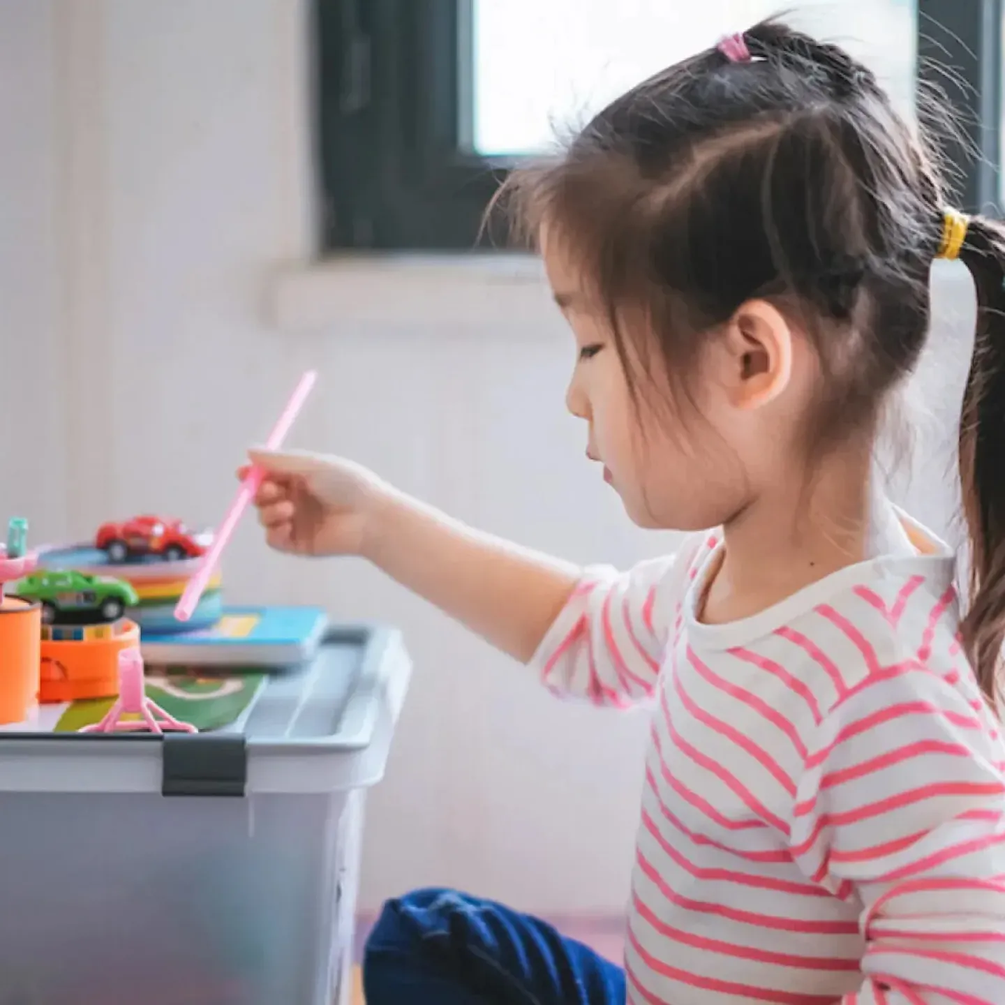 Little Girl Playing.