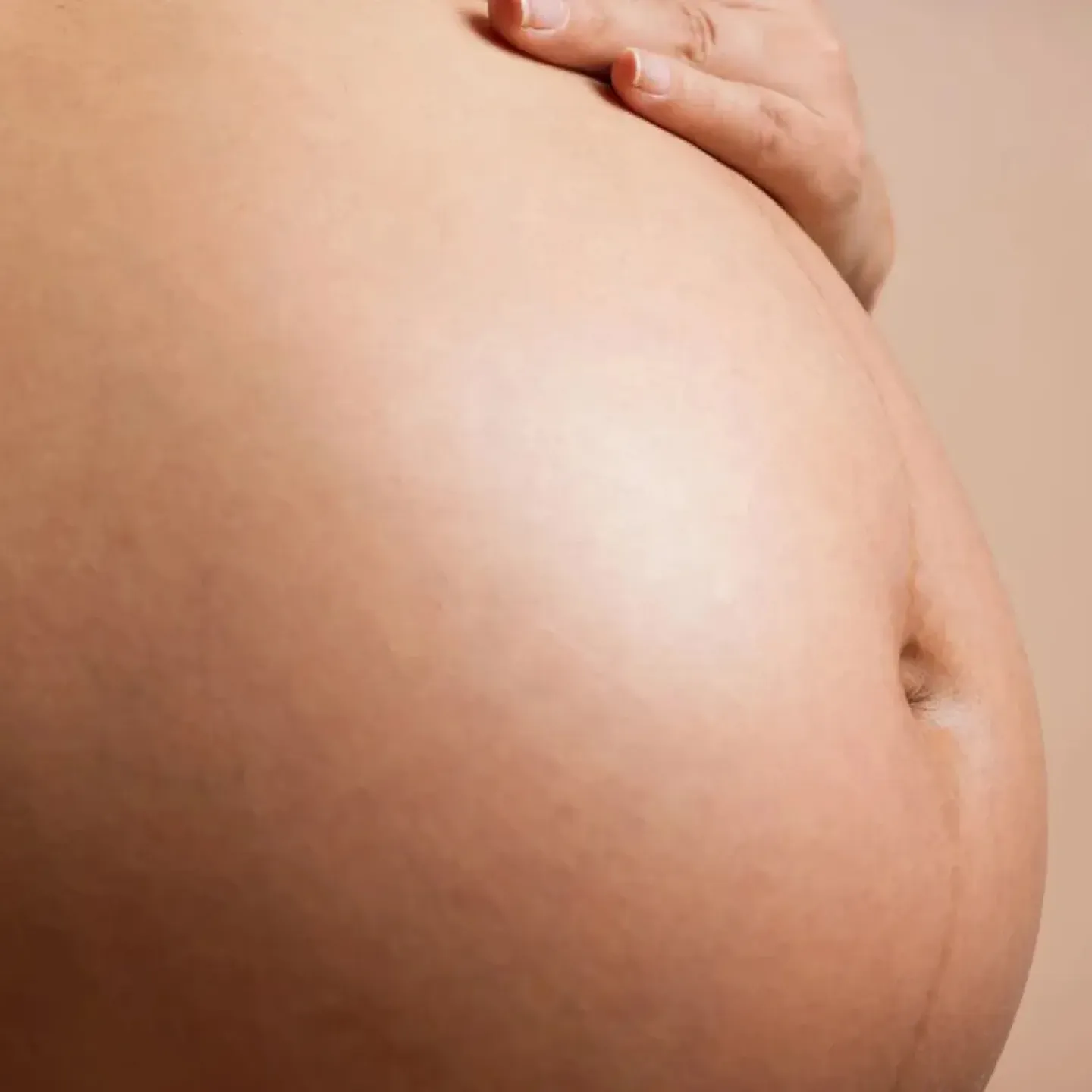 Mother's pregnant belly.