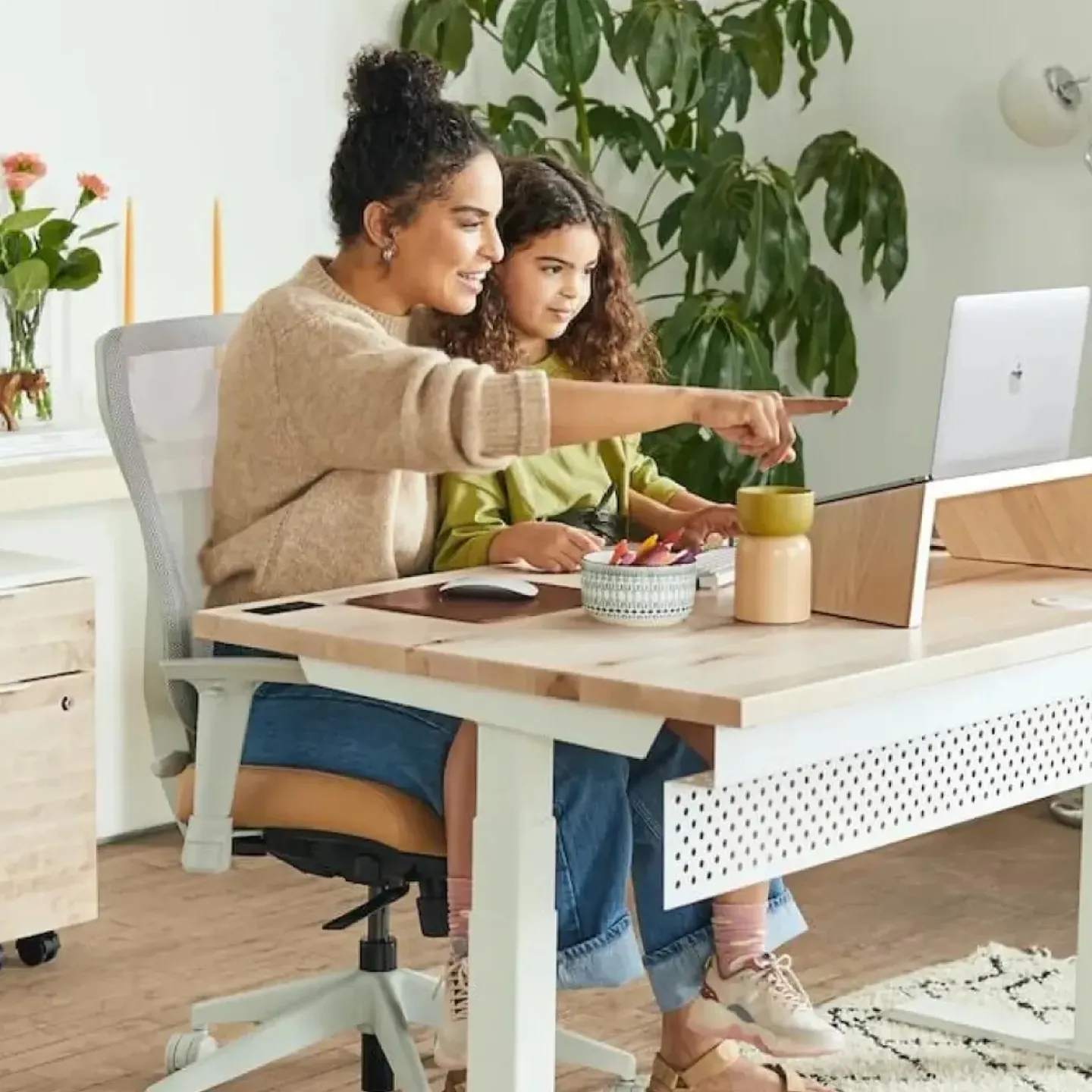 Mother and daughter with computer.