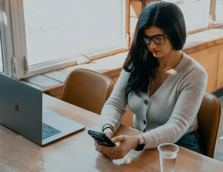 Woman on her phone.